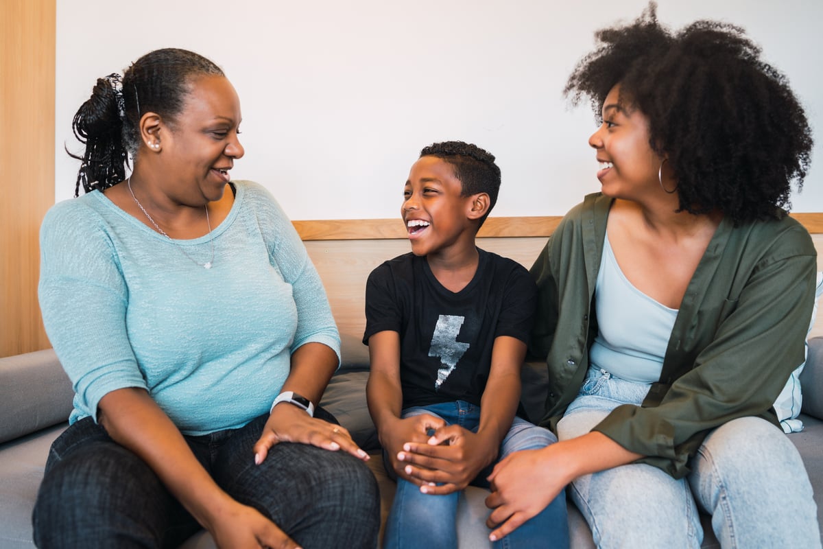 portrait-african-american-grandmother-mother-son-spending-good-time-together-home-family-lifestyle-concept